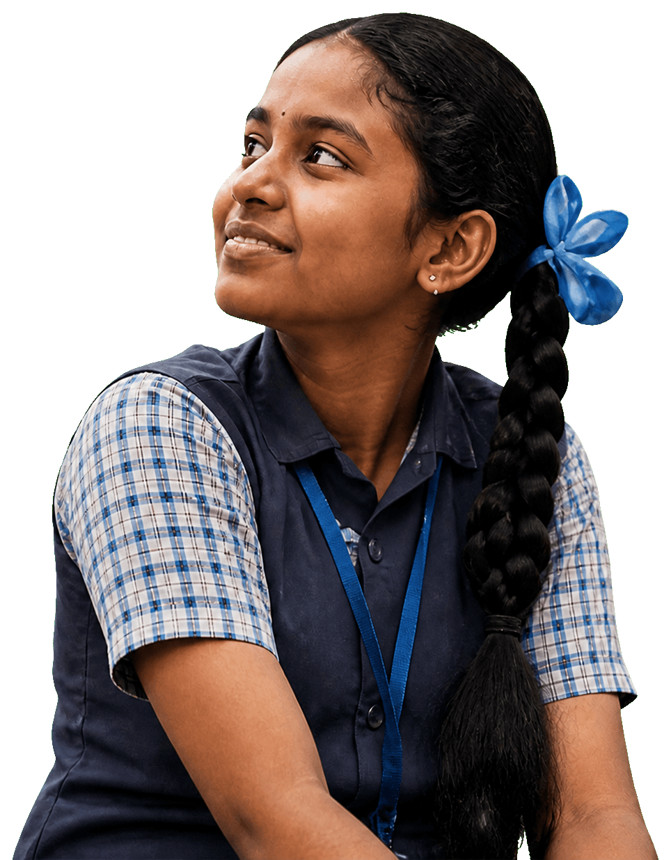 A schoolgirl looking upward with confidence