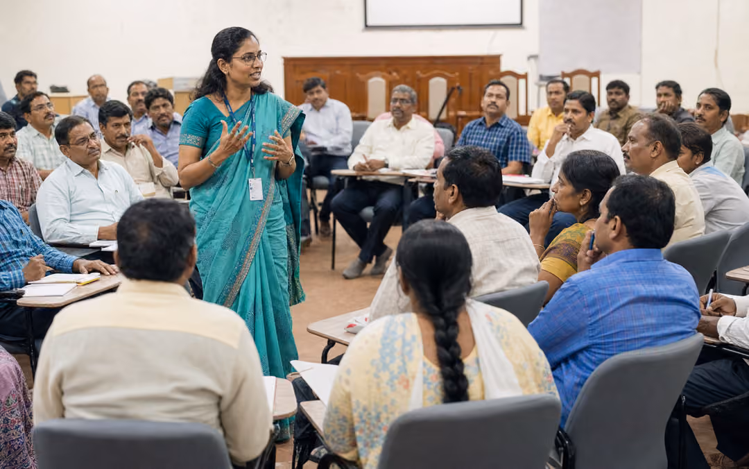 A school leader facilitating a collaborative workshop with educators